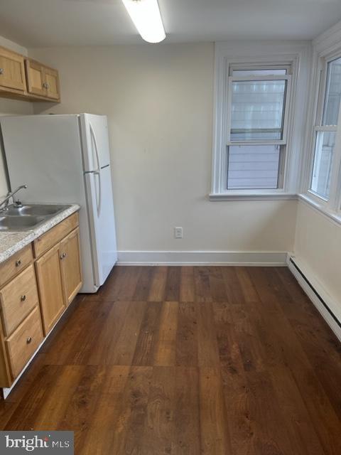 105 Cumberland Street, Unit 3 Clear Spring, MD 21722 - Photo 4 of 11 a room with wooden cabinets and window