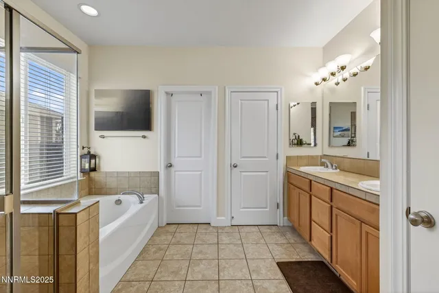 a brick building with a bench in front of it