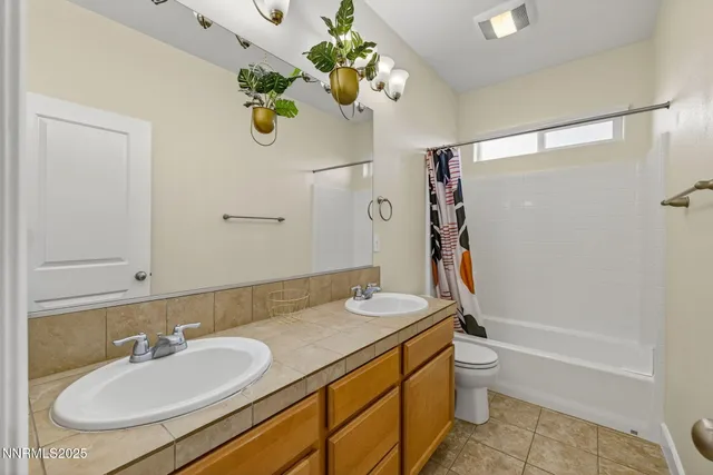 a view of a swimming pool with a patio and yard