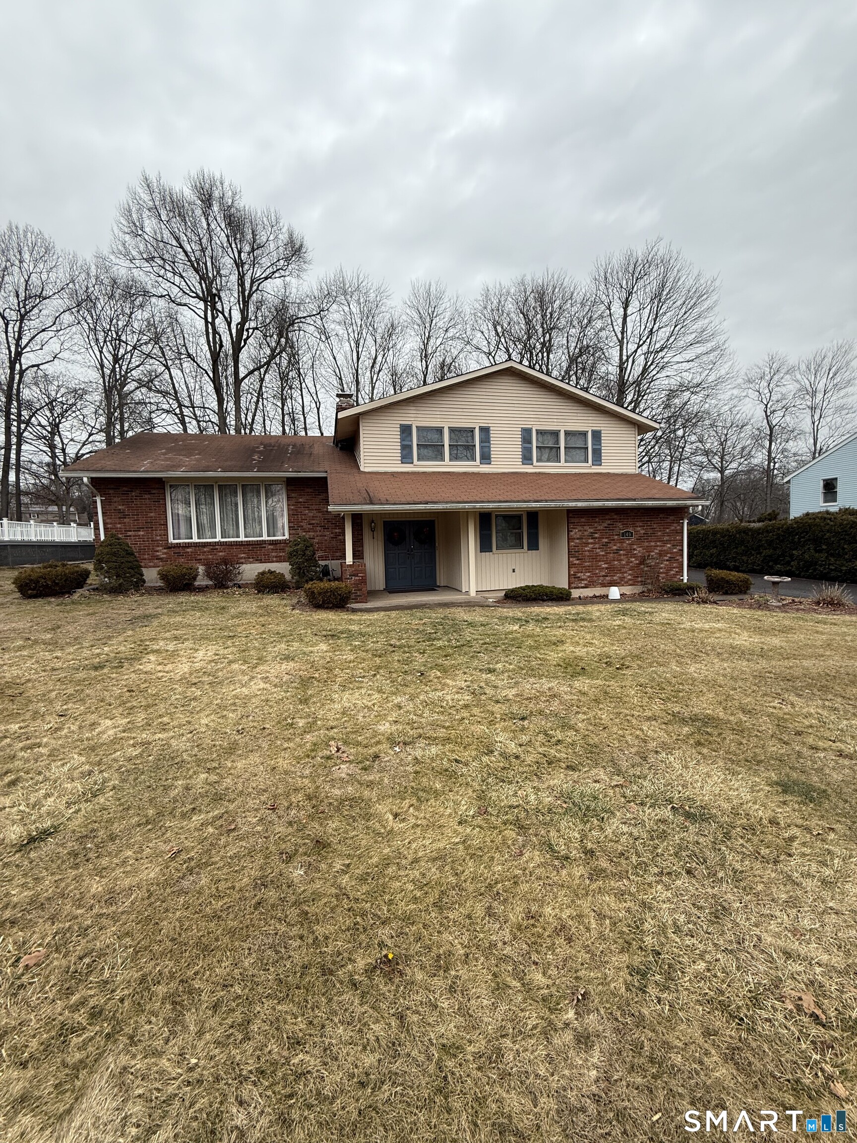149 High Tower Road Southington, CT 06489 - Photo 1 of 25 a front view of a building with garden