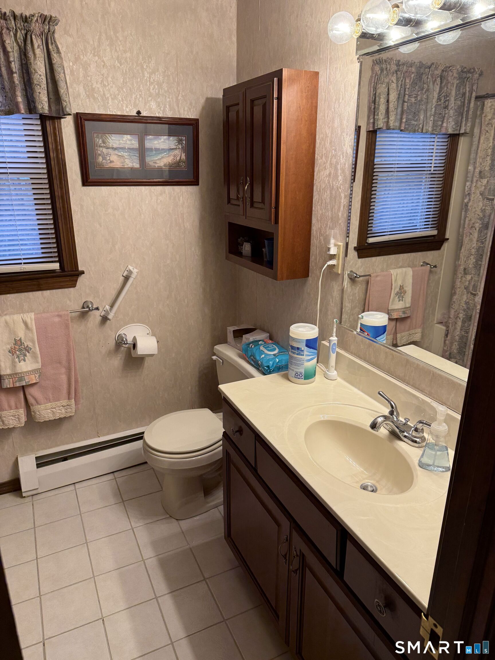 149 High Tower Road Southington, CT 06489 - Photo 21 of 25 a bathroom with a sink a toilet and mirror