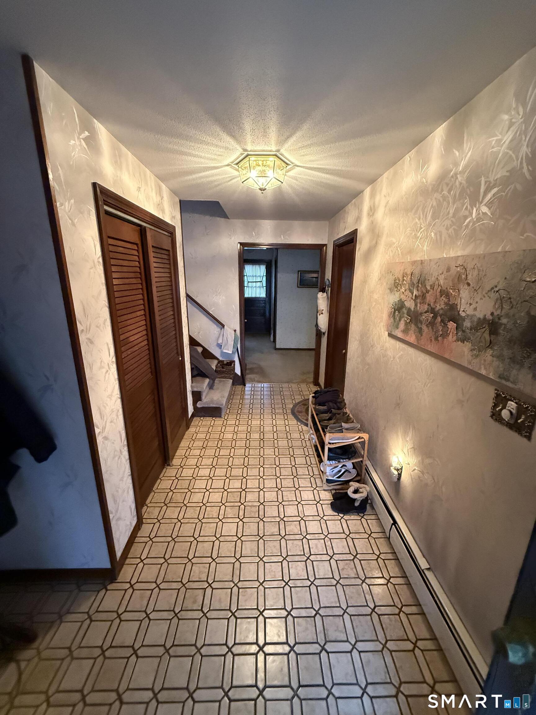 149 High Tower Road Southington, CT 06489 - Photo 5 of 25 a room with gym equipment and wooden floor