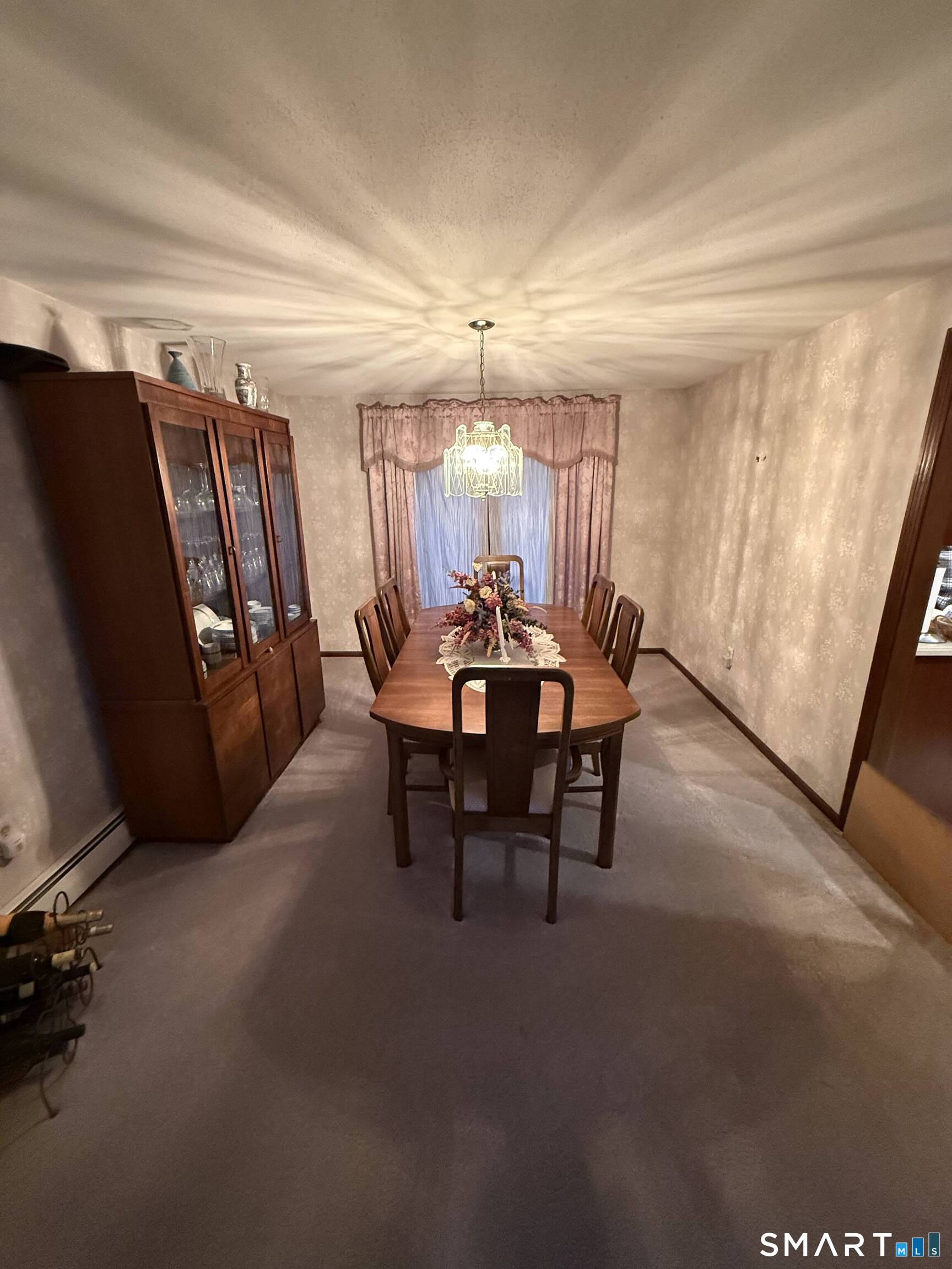 149 High Tower Road Southington, CT 06489 - Photo 9 of 25 a view of a dining room with furniture window and outside view