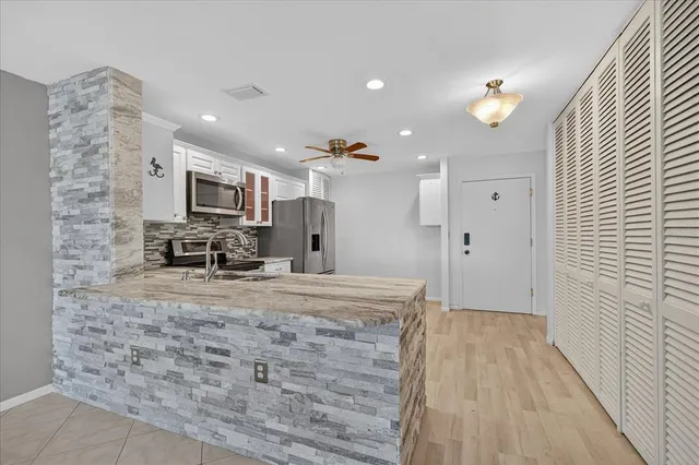 a view of kitchen and microwave