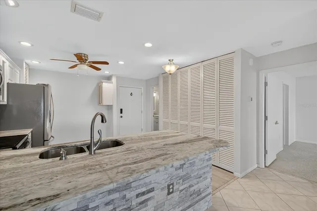 a view of a living room and bathroom