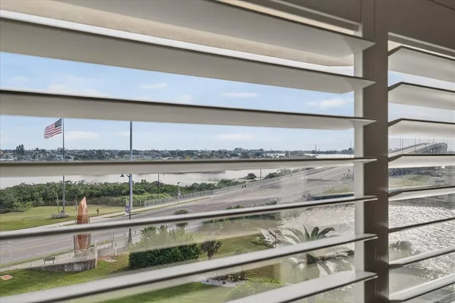 a close view of stainless steel appliances kitchen area and table