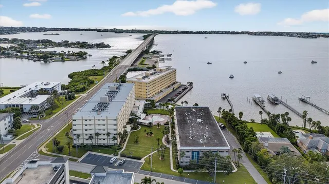 a aerial view of a house with a ocean view