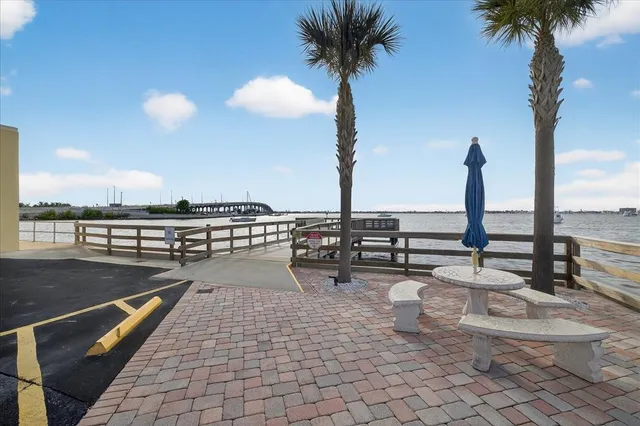 a view of swimming pool with chairs