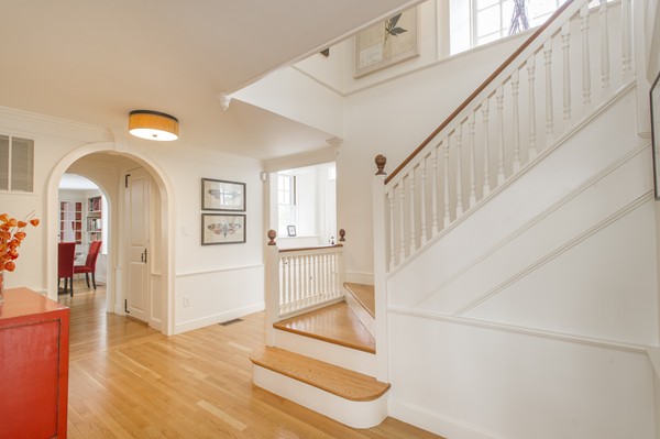 19 Lorena Road Winchester, MA 01890 - Photo 4 of 20 a view of a hallway with wooden floor and entryway