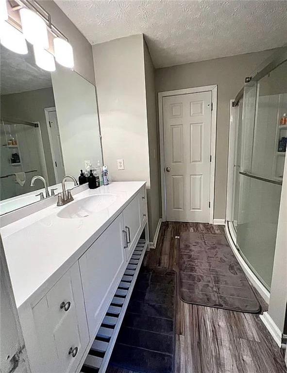 3267 Forrest Bluff Way Lithonia, GA 30038 - Photo 8 of 15 a bathroom with a sink and a mirror