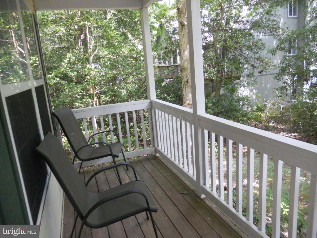 21 Rabbit Run Lane Ocean Pines, MD 21811 - Photo 14 of 22 a view of a balcony with chairs