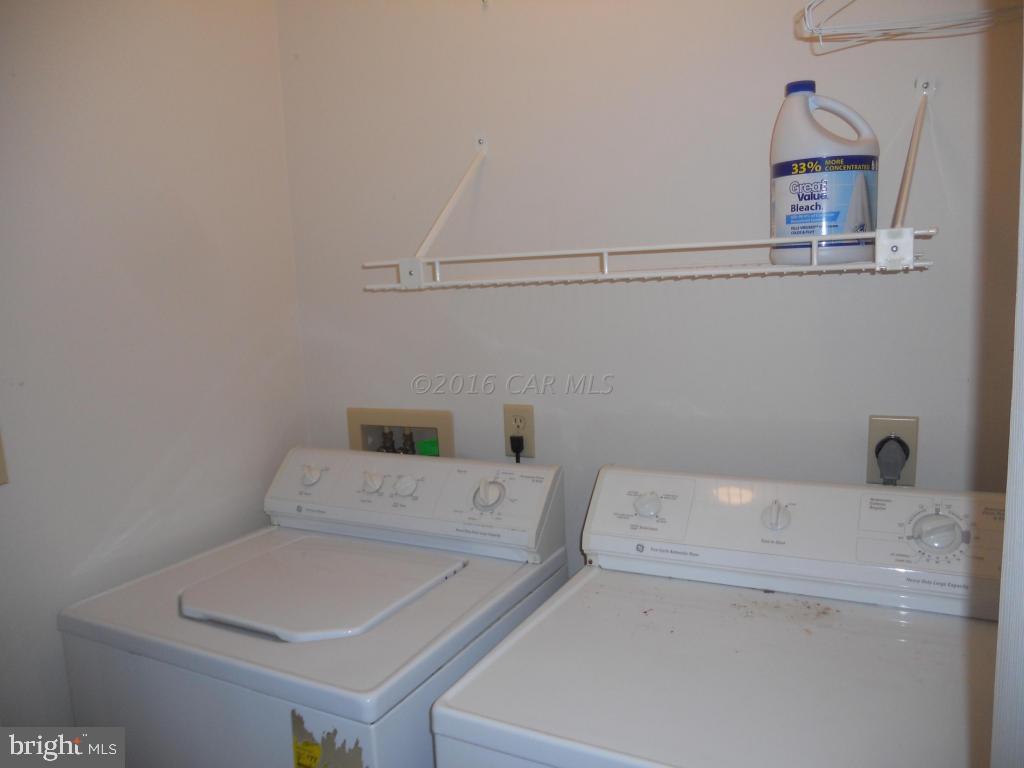 21 Rabbit Run Lane Ocean Pines, MD 21811 - Photo 18 of 22 a utility room with dryer and washer
