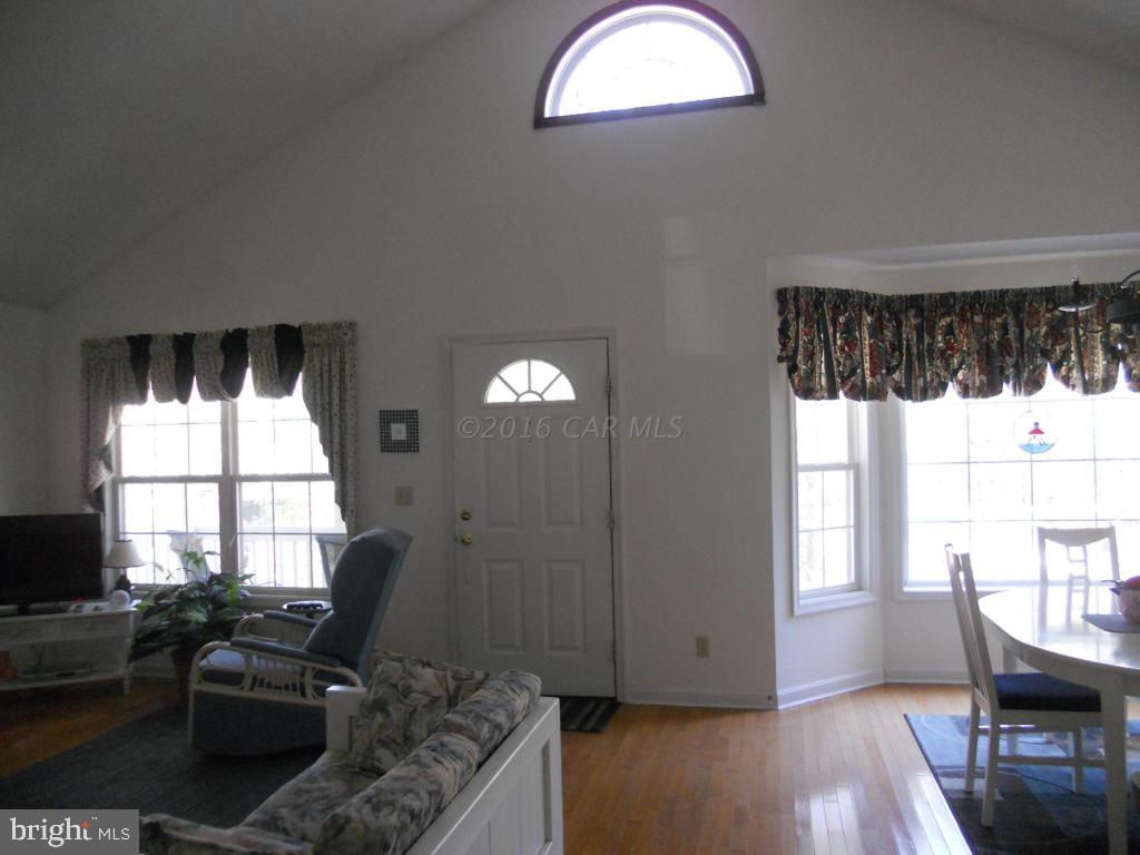 21 Rabbit Run Lane Ocean Pines, MD 21811 - Photo 6 of 22 a view of a livingroom with furniture and window