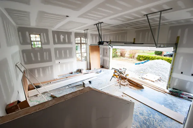 a kitchen with sink refrigerator and window