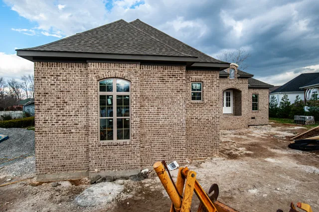 a front view of a house with patio