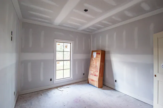 an empty room with windows