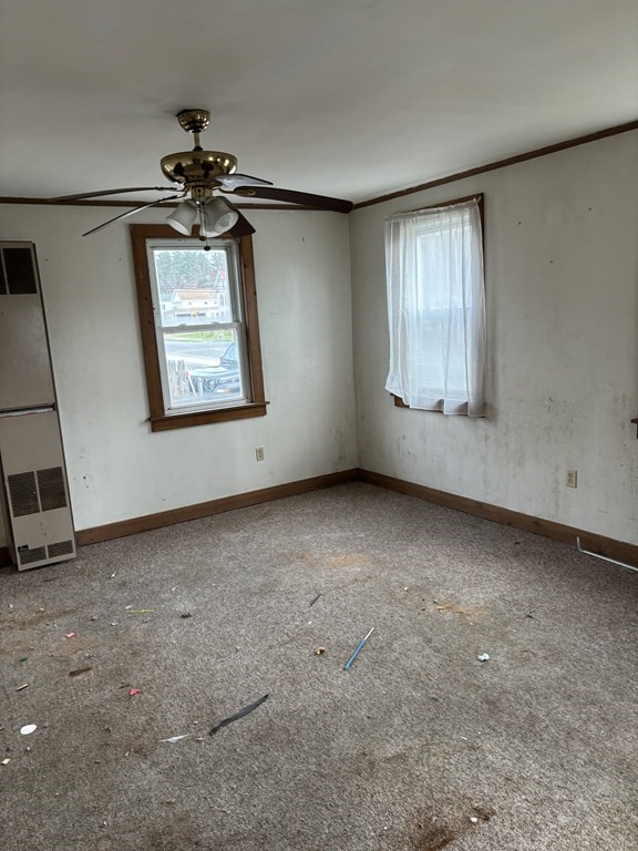 20 South Main Road Otis, MA 01253 - Photo 13 of 19 an empty room with windows and fan