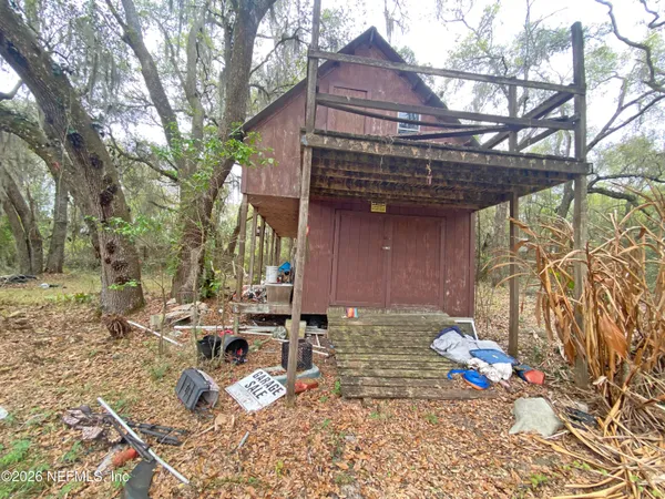 a view of backyard of house