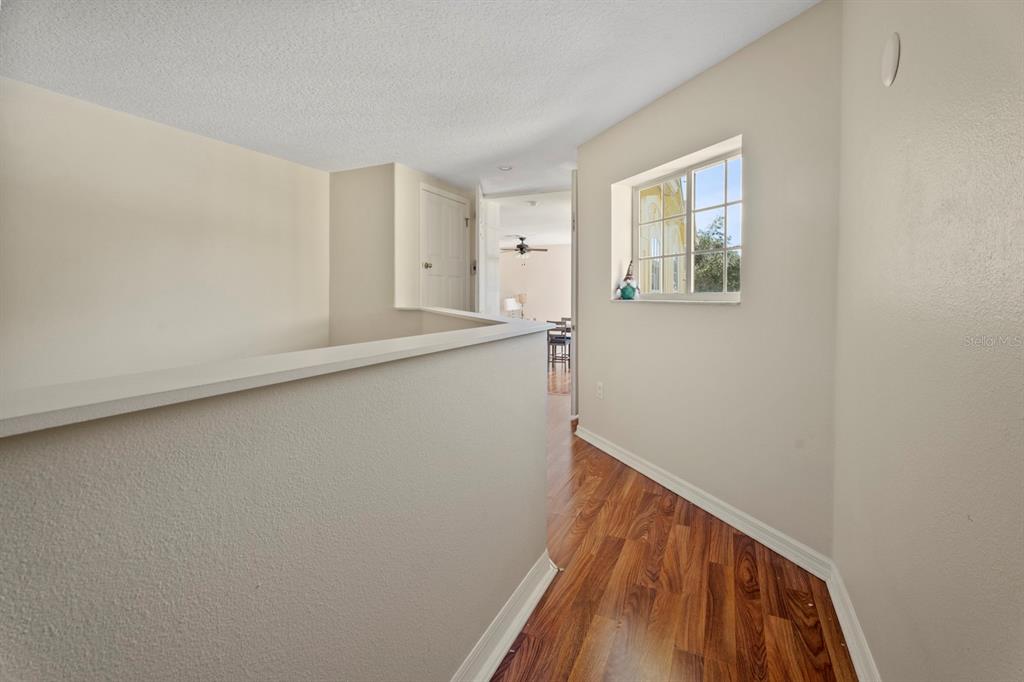 5042 Rishley Run Way Mount Dora, FL 32757 - Photo 32 of 44 a view of hallway with window