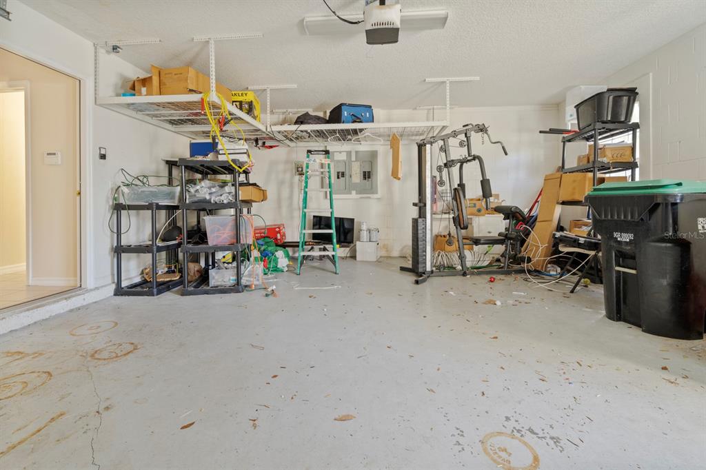 5042 Rishley Run Way Mount Dora, FL 32757 - Photo 40 of 44 a view of a room with gym equipment