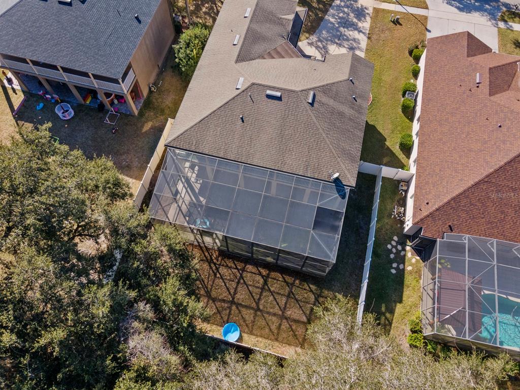 5042 Rishley Run Way Mount Dora, FL 32757 - Photo 44 of 44 an aerial view of a house with a yard