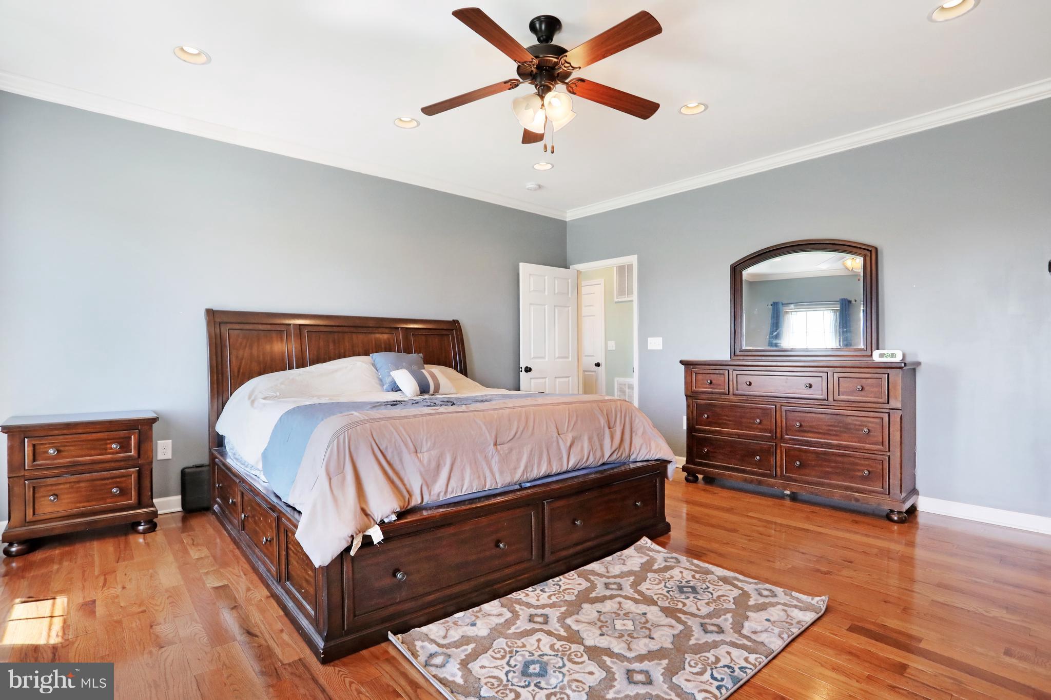 14213 Hicksville Road Clear Spring, MD 21722 - Photo 22 of 30 a bedroom with a bed and a dresser
