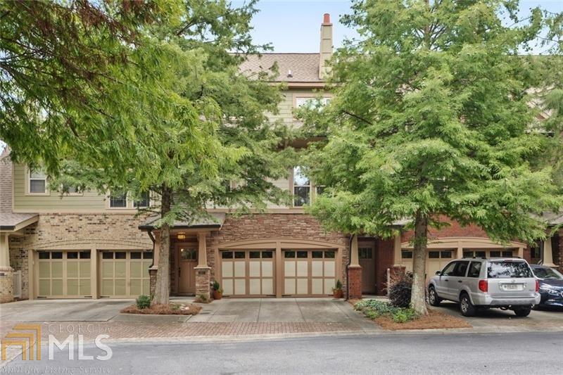 Welcome Home!  This small enclave of homes is nestled in the heart of Johns Creek & close to everything.