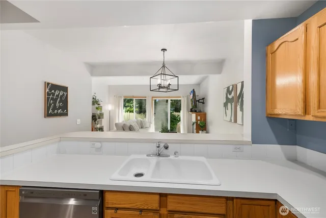 a bathroom with a sink and a window