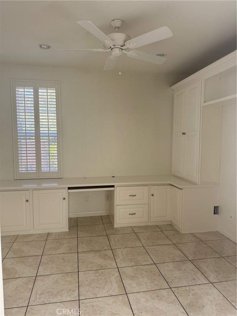 137 Tall Oak Irvine, CA 92603 - Photo 5 of 12 a view of an empty room with a window