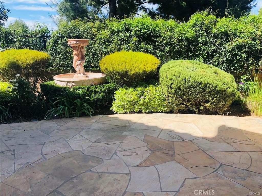 137 Tall Oak Irvine, CA 92603 - Photo 9 of 12 a view of a backyard