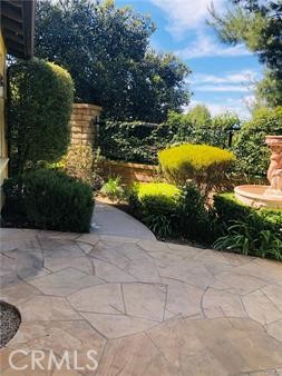 137 Tall Oak Irvine, CA 92603 - Photo 10 of 12 a view of a pathway both side of yard