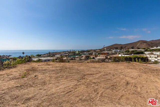 a view of lake with mountain