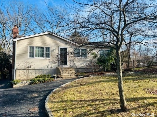 55 Ficus Road Rocky Point, NY 11778 - Photo 1 of 1 a view of a house with a yard