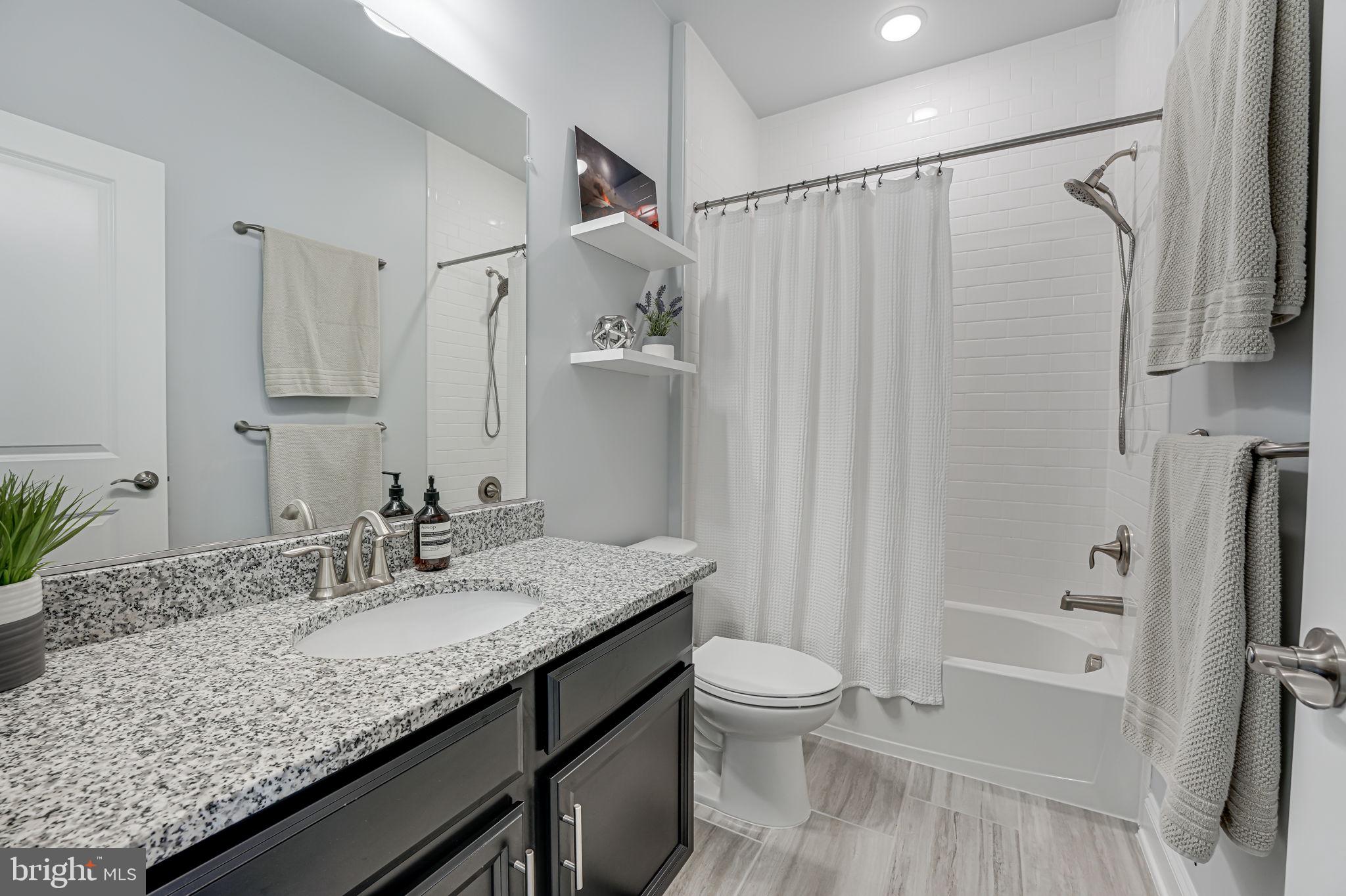 17372 Redshank Road Dumfries, VA 22026 - Photo 35 of 80 Full hallway bath w/dual bowl vanity