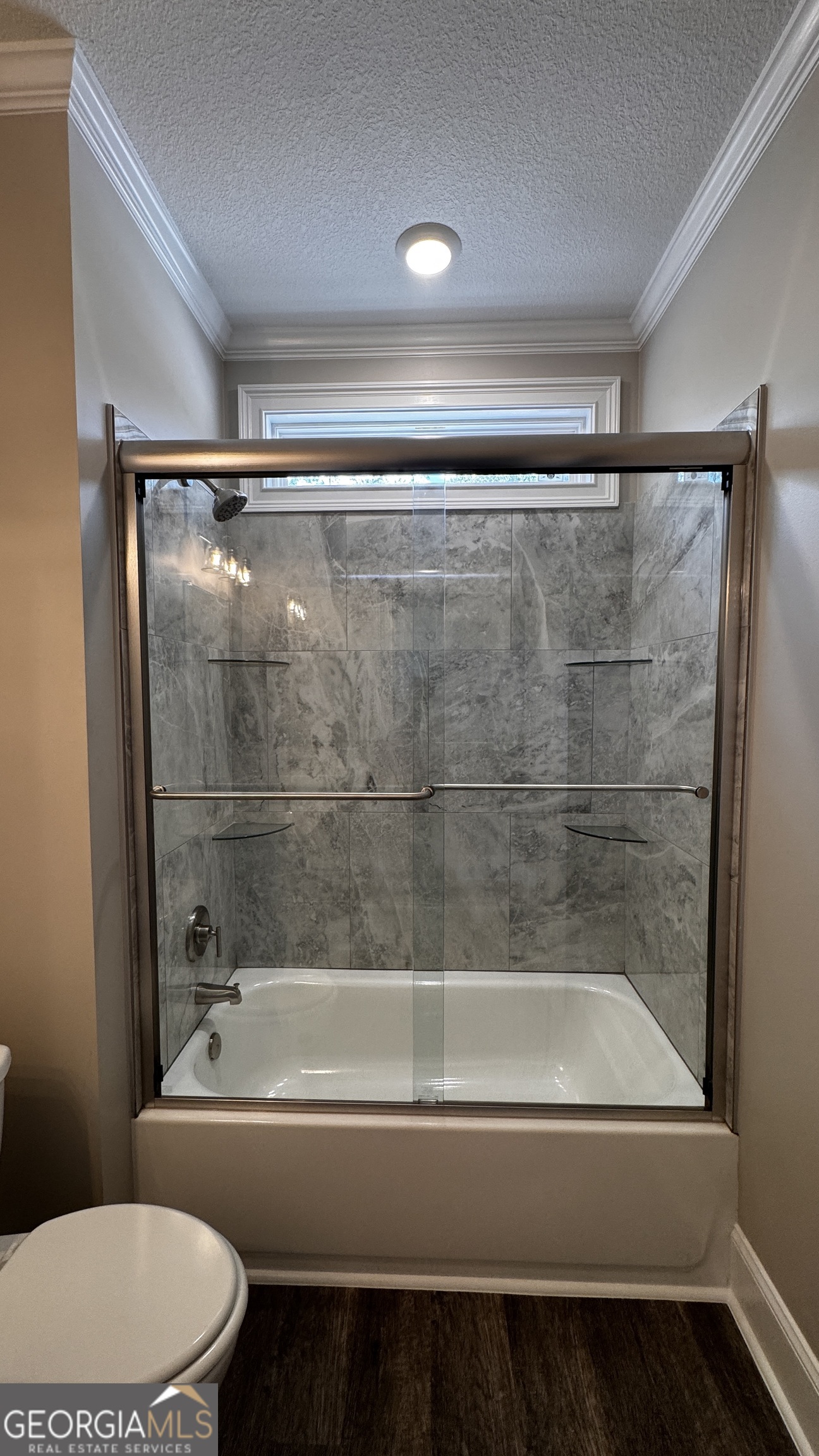 3 Willow Pointe Claxton, GA 30417 - Photo 21 of 31 a bathroom with a bathtub and a toilet