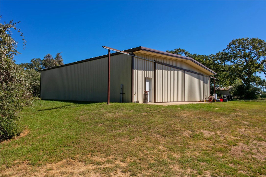 11041 Jackrabbit Lane Bryan, TX 77808 - Photo 11 of 47 a backyard of a house with wooden fence