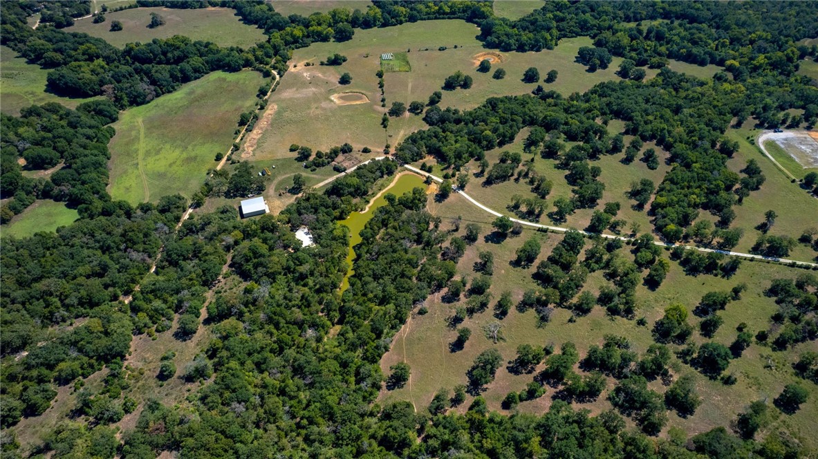 11041 Jackrabbit Lane Bryan, TX 77808 - Photo 43 of 47 an aerial view of residential house with outdoor space