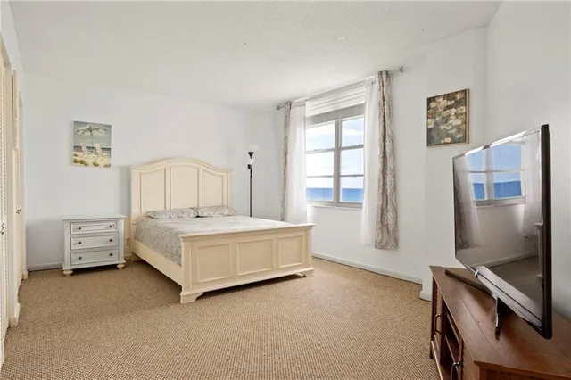 a kitchen with a table and chairs