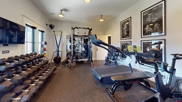 a living room with furniture and a rug