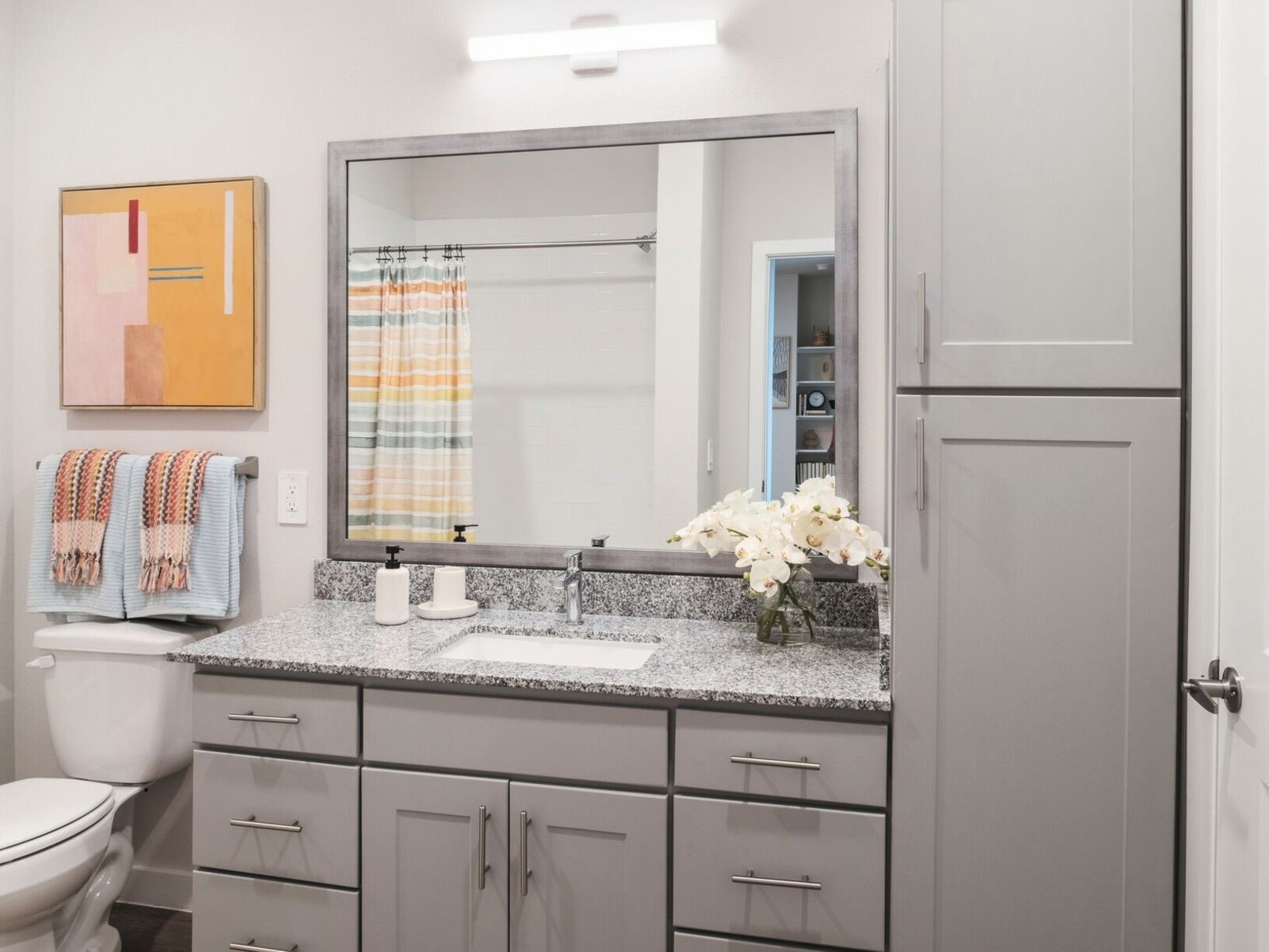 23100 Clay Road, Unit 2106 Katy, TX 77493 - Photo 10 of 29 a bathroom with a granite countertop sink and a mirror