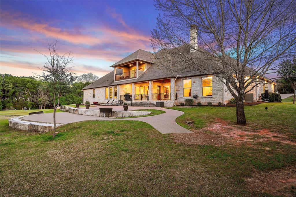 14690 Chapel Road Lorena, TX 76655 - Photo 31 of 40 a view of a house with backyard and a tree