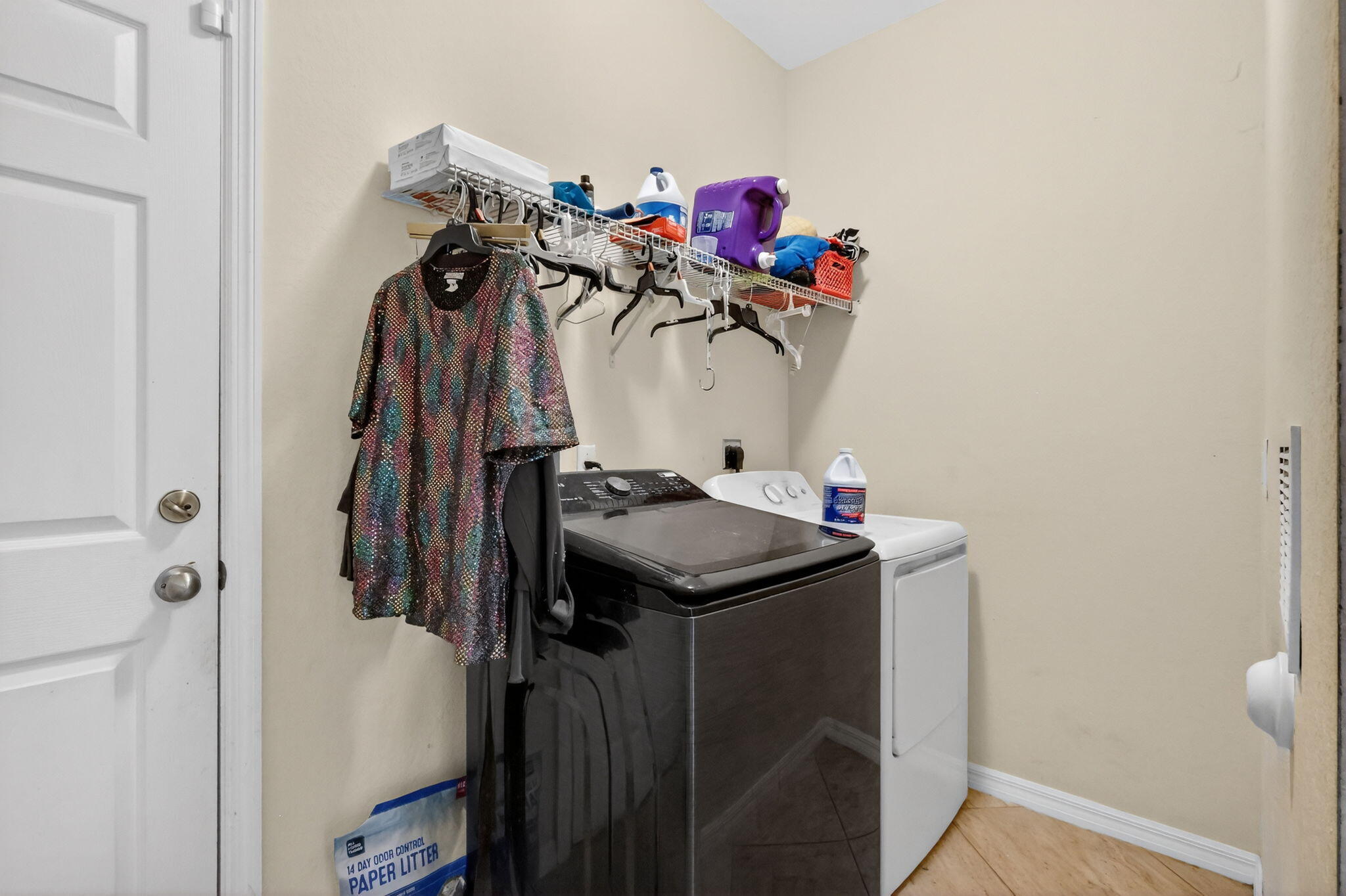 6720 Osage Circle Greenacres, FL 33413 - Photo 13 of 54 a utility room with dryer and washer