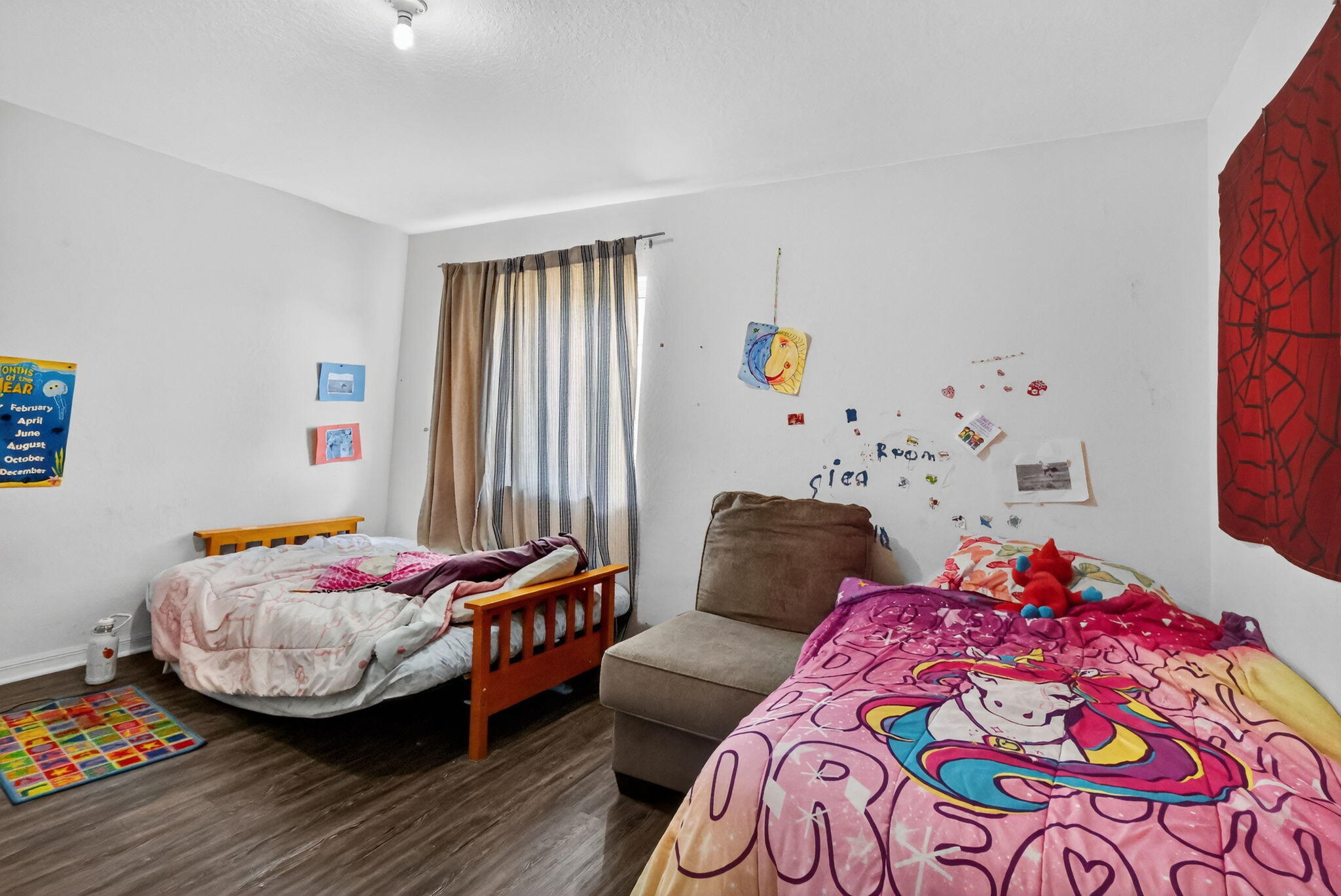 6720 Osage Circle Greenacres, FL 33413 - Photo 30 of 54 a bedroom with bed and a window