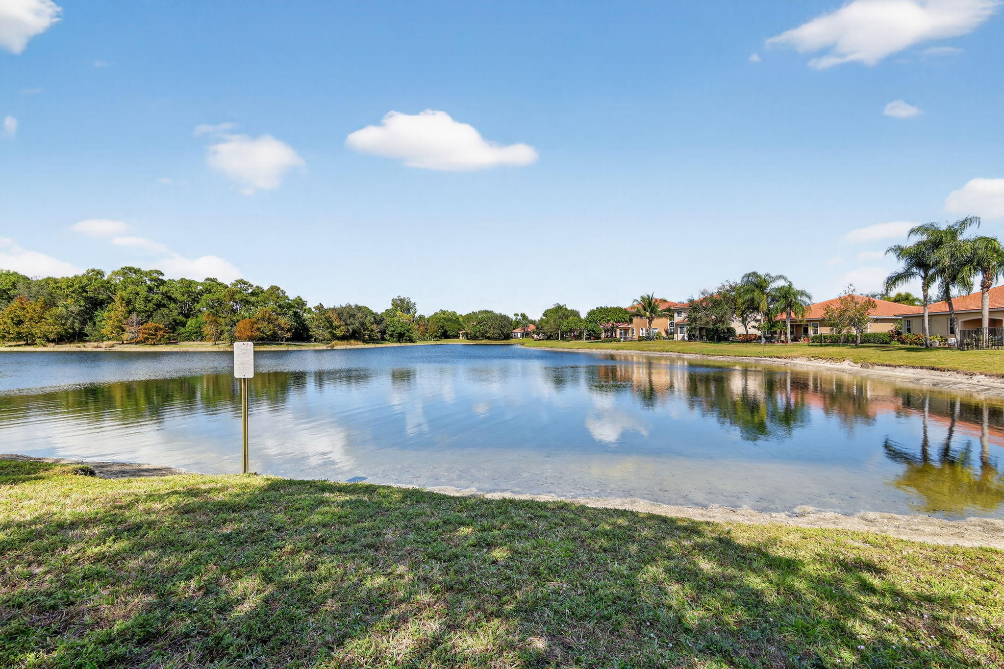 6720 Osage Circle Greenacres, FL 33413 - Photo 38 of 54 a view of a lake