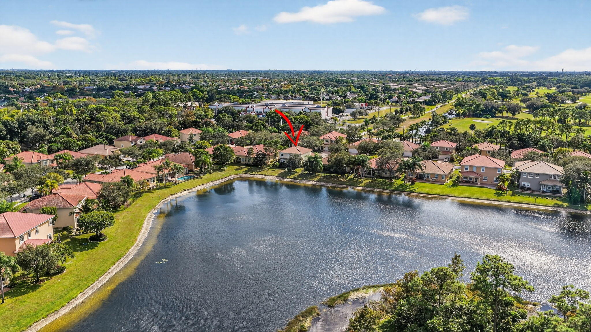 6720 Osage Circle Greenacres, FL 33413 - Photo 46 of 54 an aerial view of a residential houses with outdoor space and swimming pool