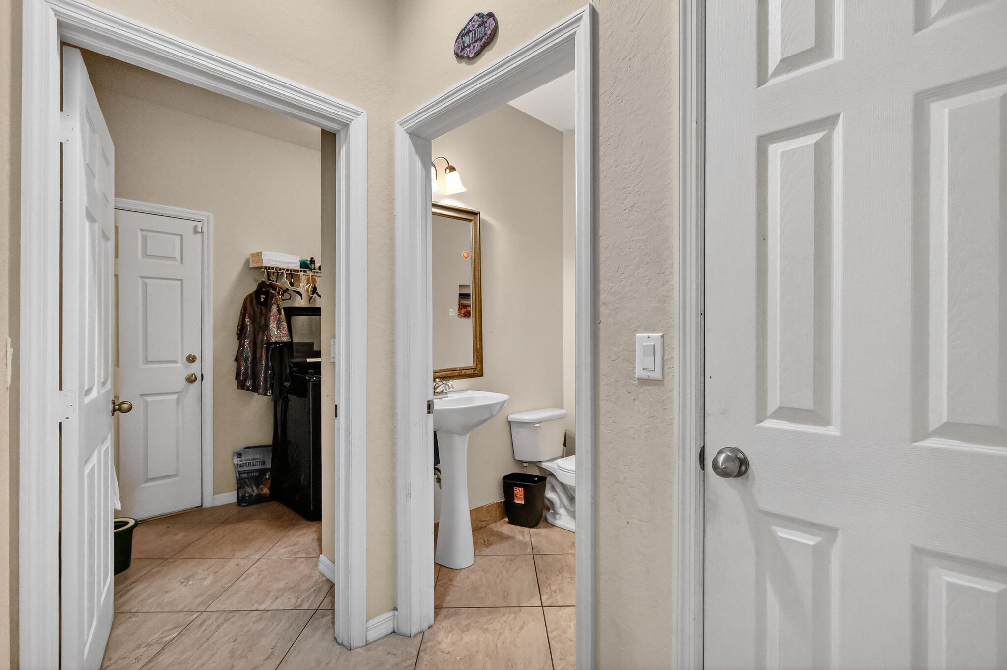 6720 Osage Circle Greenacres, FL 33413 - Photo 8 of 54 a view of a hallway with closet and a livingroom view