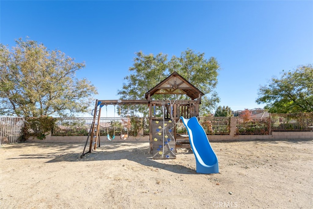 41640 Merryvale Lane Palmdale, CA 93551 - Photo 4 of 40 a view of a park with slide
