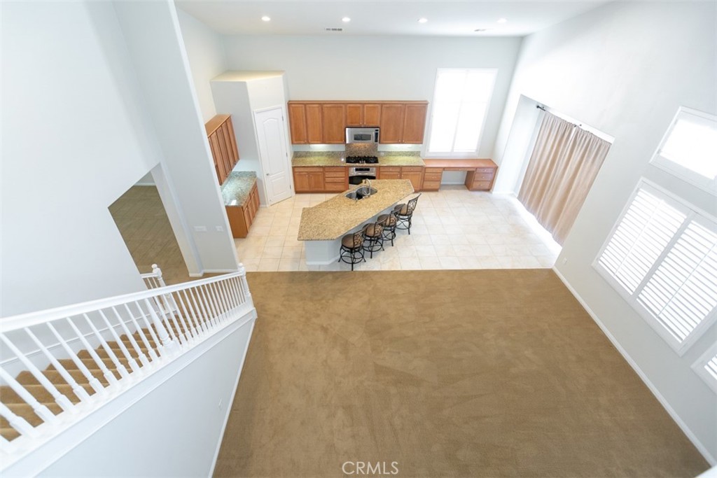 41640 Merryvale Lane Palmdale, CA 93551 - Photo 9 of 40 a dining room with furniture and a large window