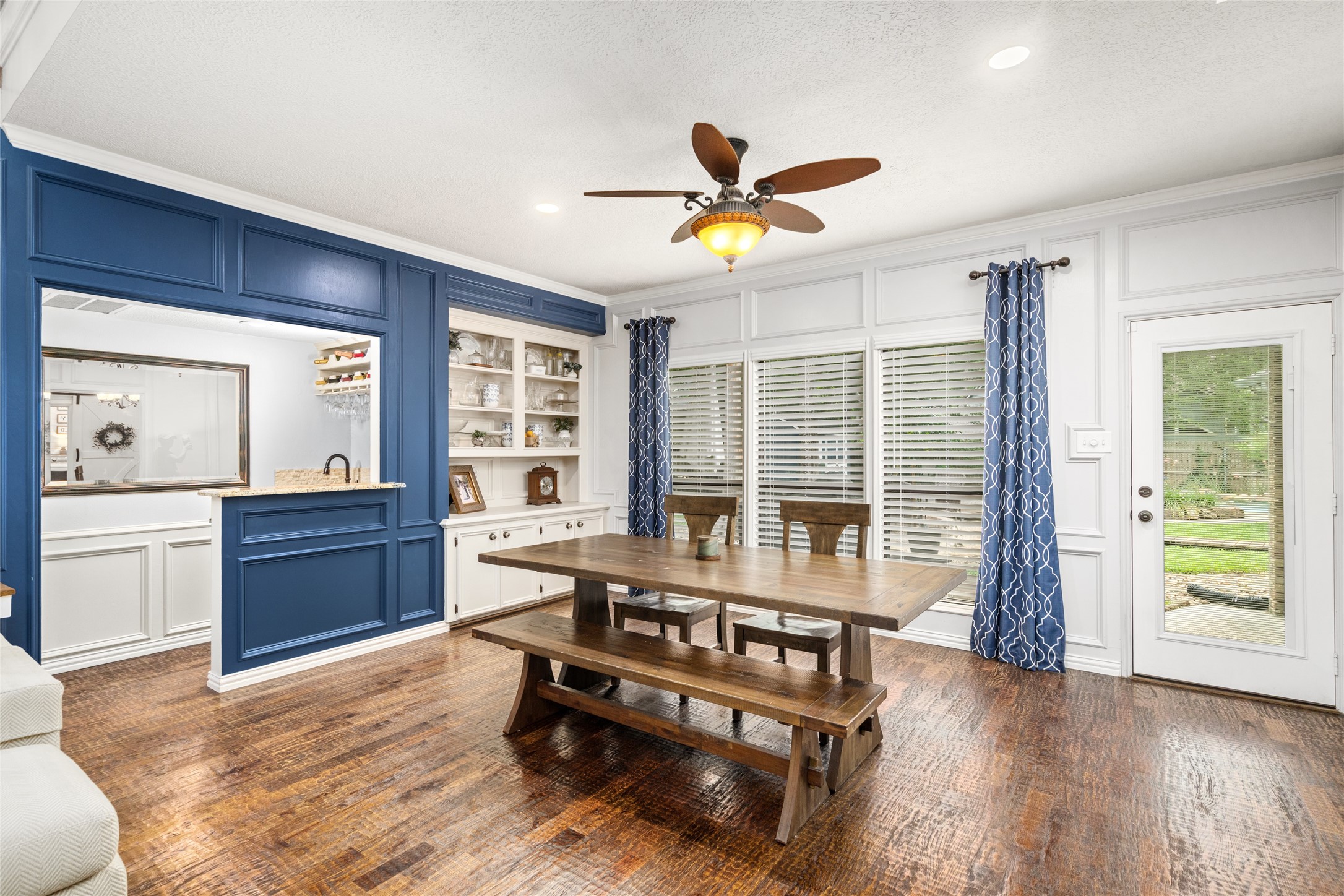 77 South Placid Hill Circle Spring, TX 77381 - Photo 12 of 48 The formal dining room features custom-built-in cabinetry and access to the backyard.
