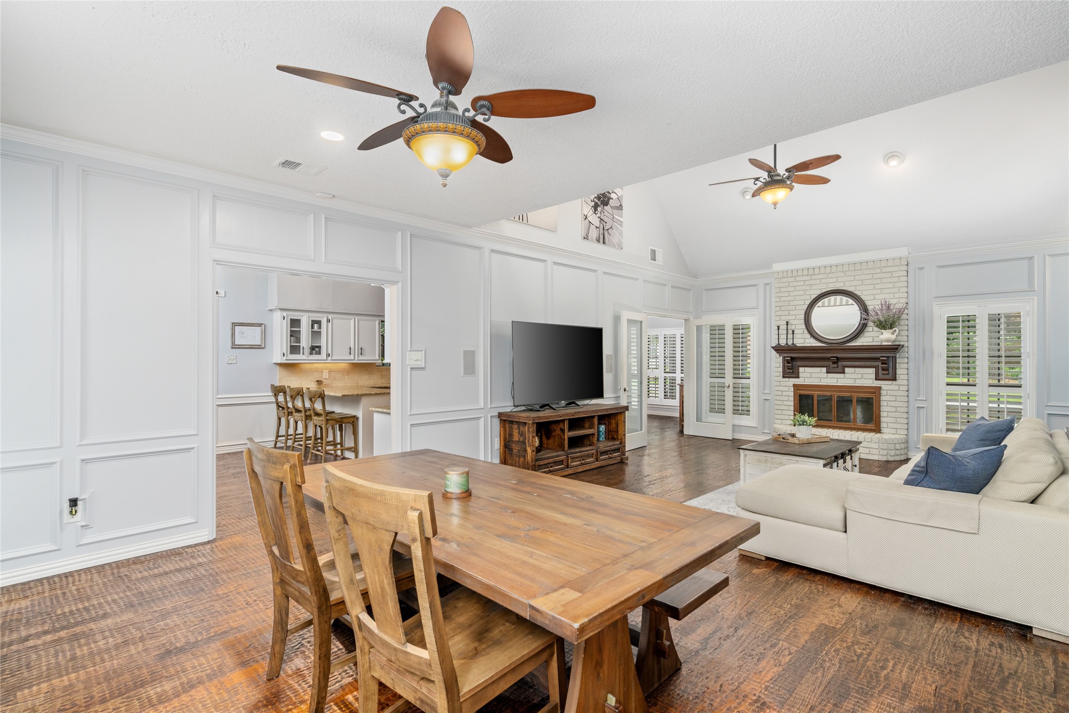 77 South Placid Hill Circle Spring, TX 77381 - Photo 13 of 48 The formal dining room is open to the kitchen and living room.
